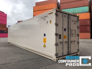 40' high cube reefer container at intermodal depot in front of shipping container stacks, 40 foot reefer container sample photo, 40 foot reefer container cargo doors angle, reefer container doors, 40 foot refrigerated shipping container, one trip reefer container, one trip 40 foot refrigerated shipping container, reefer container, 40' reefer, new reefer container, reefer container for sale, rent refrigerated storage, reefer trailer, refrigerated intermodal shipping container, cold storage container, 40' high cube refrigerated container, reefer trailer storage, Reefer Container Pros